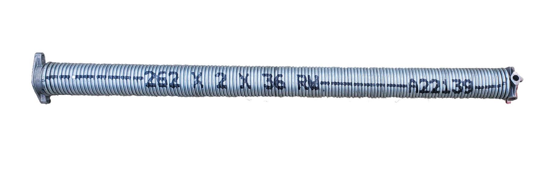 Close view of a garage door torsion spring